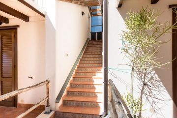 First floor apartment in residence with balconies