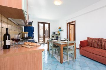 First floor apartment in residence with balconies