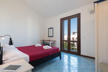 First floor apartment in residence with balconies